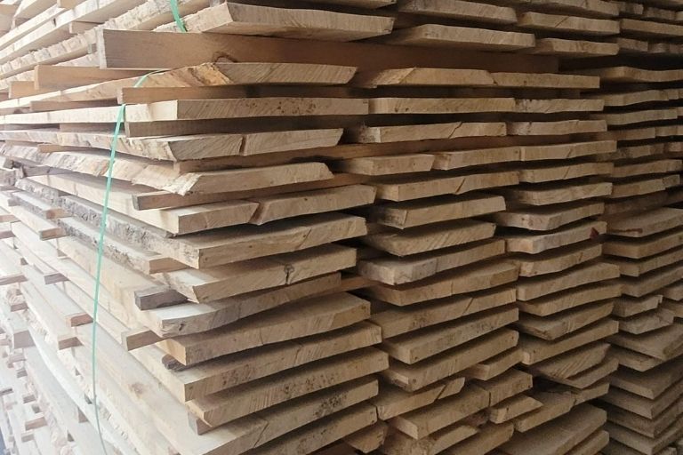 Steamed and natural beech timber boards stacked for export